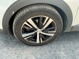 a close up of a tire on a car ' s rim