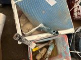 a pile of assorted items sitting on the ground