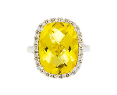 a yellow sapphire and diamond ring