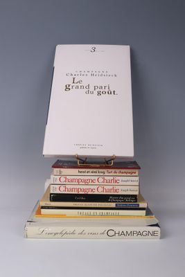 books stacked on top of each other on a white surface