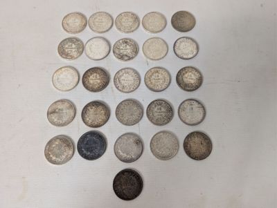 an image of a pile of old coins sitting on top of a table