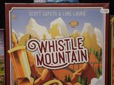 two board games that are on display on a table