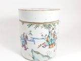 a white container with a painting of people on it