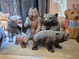 a bunch of bears that are sitting on a shelf