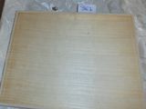 a picture of a piece of wood that is on a table