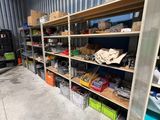 a room with a lot of shelves and boxes on it