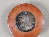 a coin that is sitting on top of a table