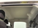 a view of the inside of a van from the driver ' s seat