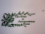 a white plate with a green design on it