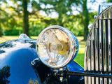 a close up of a car ' s headlight and grill