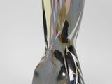 a black and white vase that is sitting on a table