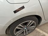 a car that has a sticker on the side of it