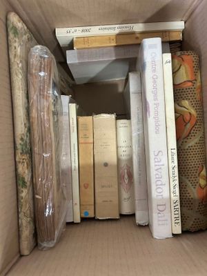 a box full of books that are sitting on a table