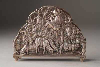 an image of a silver sculpture of a woman and a horse