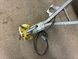 a picture of a close up of a tool on the ground