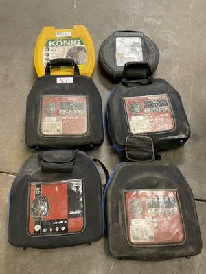 several different types of tools are laid out on the floor