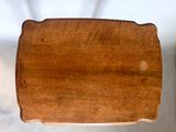 a wooden tray that is sitting on top of a table