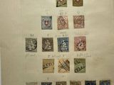 an old sheet of paper with a lot of stamps on it