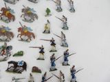 a lot of figurines that are on a table