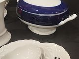 a white and blue bowl and a blue and white bowl and a white and blue bowl and a white and blue bowl and a black and white bowl and