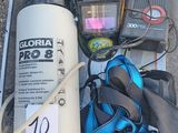a box with scuba gear and a bottle of water in it