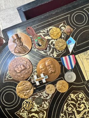 a table with a lot of medals and medals on it