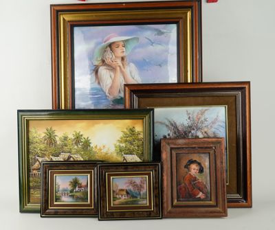 many framed pictures of a woman on the wall