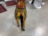 a statue of a horse that is on display in a store