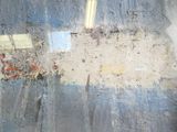 a blurry photo of a street with a building in the background