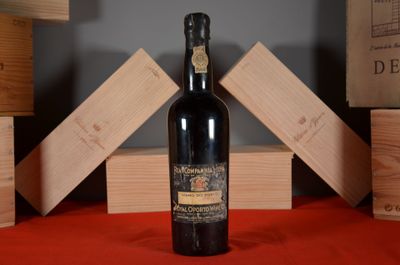a bottle of wine that is sitting on a table