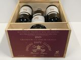 three bottles of wine in a wooden box