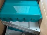 a box with a blue lid that is inside of it