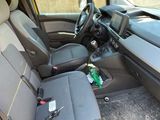 the interior of a car with the front seats folded down