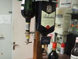 a bottle of wine and a bottle of wine sitting on a counter