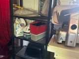a shelf that has a bunch of items on it