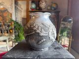 a vase that is sitting on top of a table