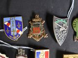 a lot of pins that are on a black surface