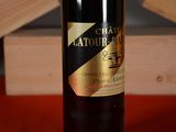 a bottle of wine that is sitting on a table
