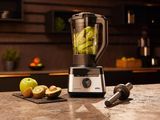 a blender that is sitting on a counter in the kitchen