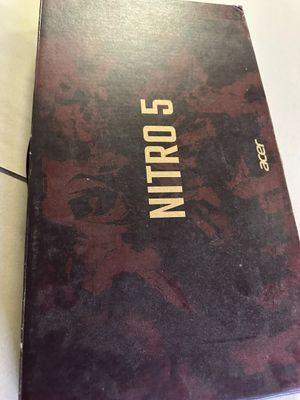 an old book sitting on a table with a mouse on top of it