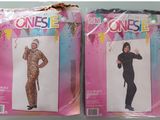 two packages of costumes on display on the table