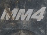 a close up of a skateboard with a sticker on it