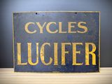 a blue sign that says cycles luciferer on it