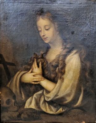 un vieux tableau représentant une femme tenant un oiseau dans ses mains