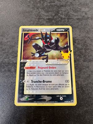 a close up of a pokemon card sitting on top of a table