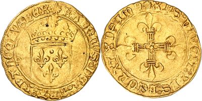a gold coin with a cross and shield on it