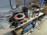 a shelf full of assorted items in a garage
