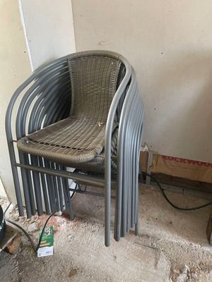 a chair that is sitting in the corner of a room