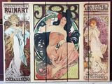 three panels of art nouveau paintings on a wall in a room