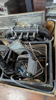 a box full of assorted items sitting on the floor